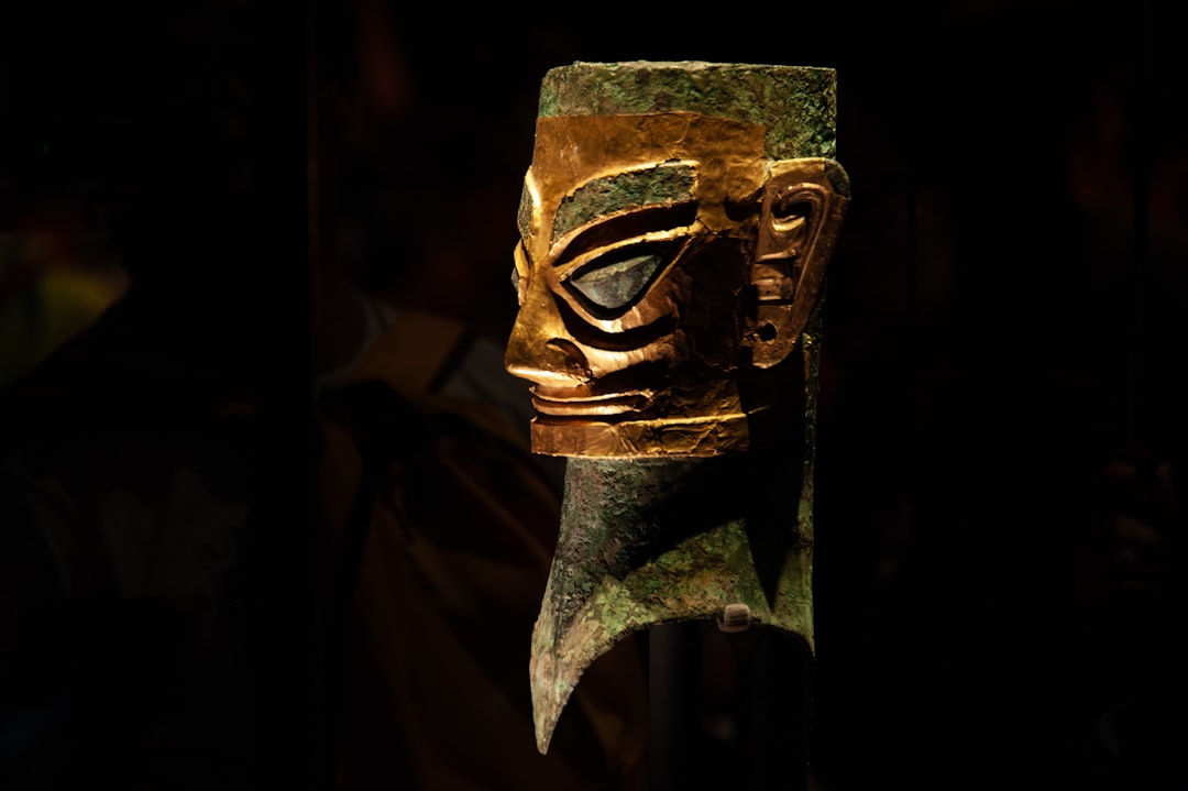 Close-up of a bronze artifact from Sanxingdui, focusing on intricate details and enigmatic features.