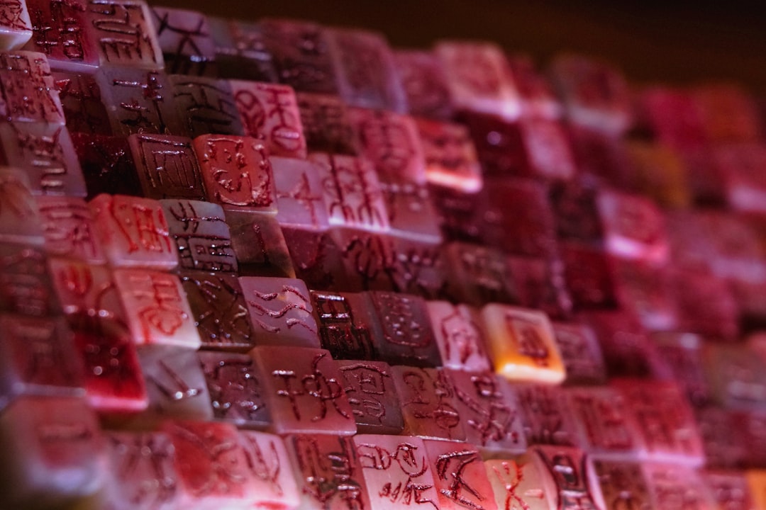 Stack of Chinese Yuan banknotes on a wooden table