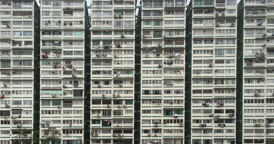 Wide shot of apartment buildings in Hong Kong, some older and more densely packed