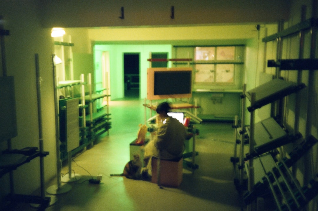 Dark and moody ICU scene with medical equipment visible