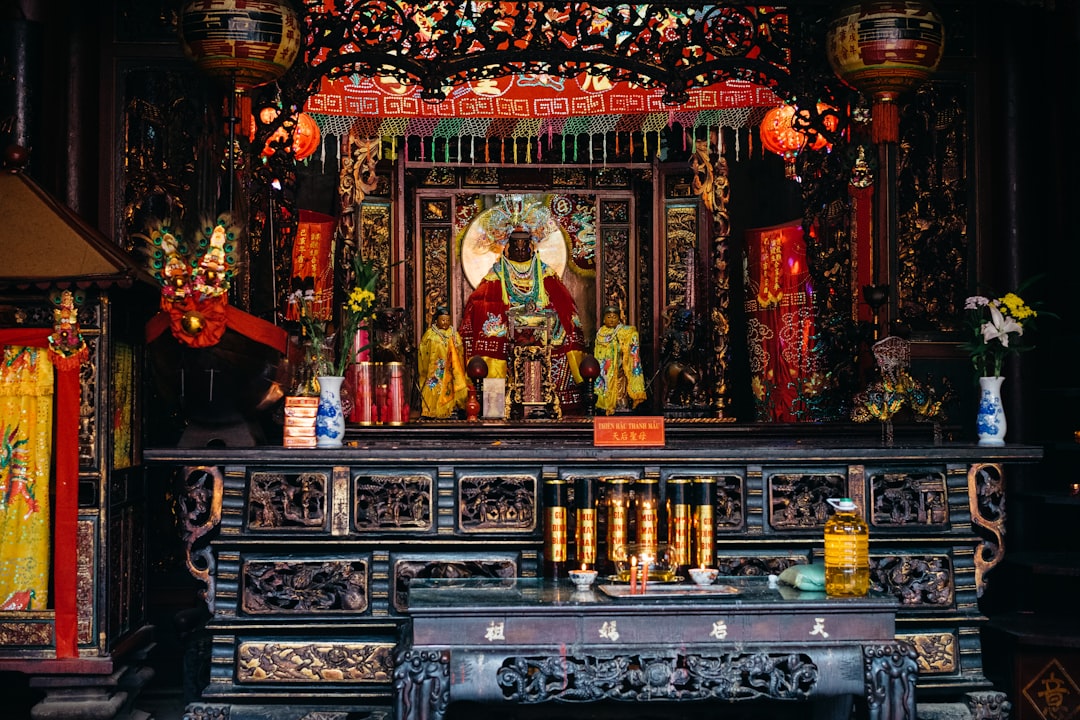 Traditional Chinese altar with incense and offerings