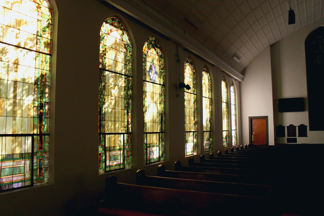 Modern church interior with light streaming through windows