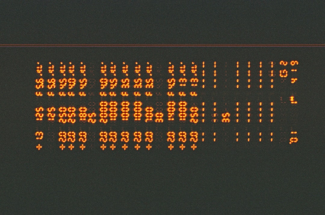 Computer screen displaying lines of code with a padlock icon superimposed.